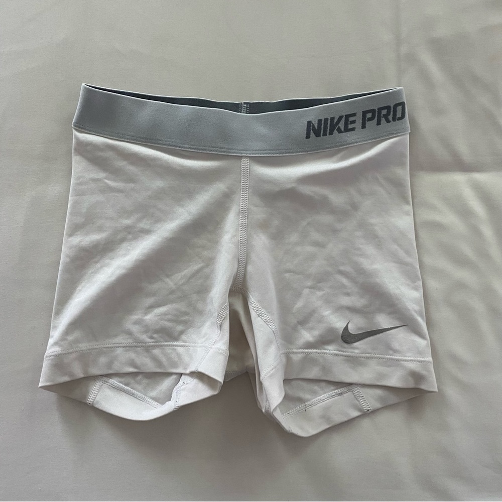 Small White Nike Pros